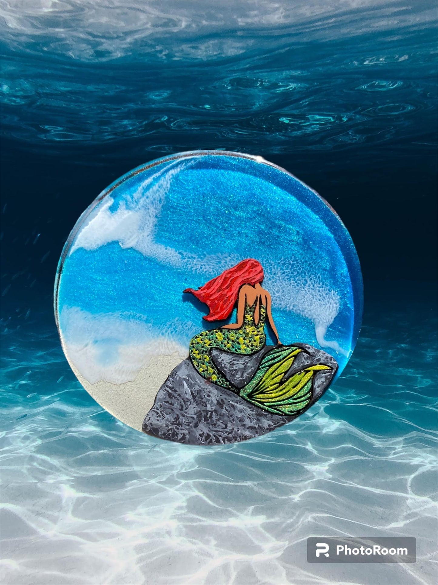 Redheaded Mermaid Overlooking the Sea during the Day